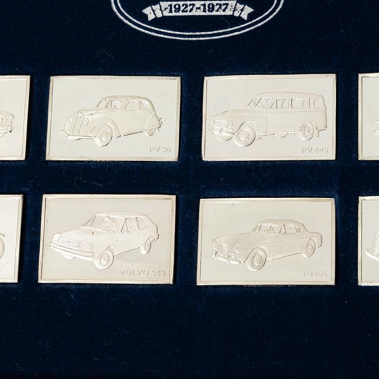 Plaketter, 12 st, silver, "De Historiska Volvobilarna 1927-1977", Franklin Mint.
