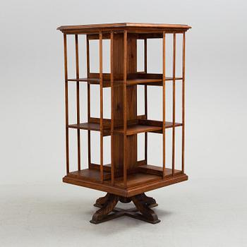 An early 20th century turning book shelf.