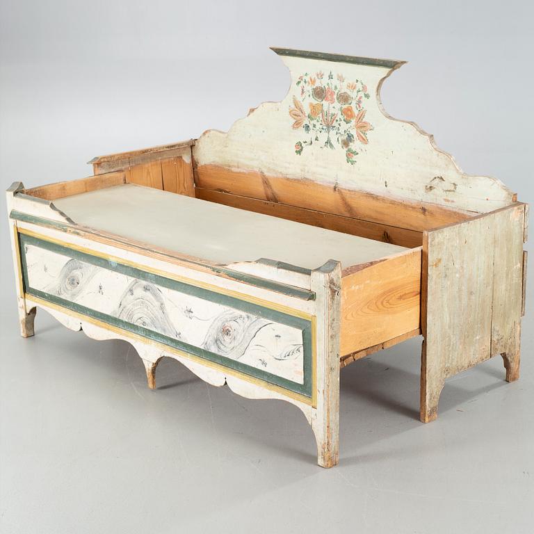 A 19th century pull-out couch.