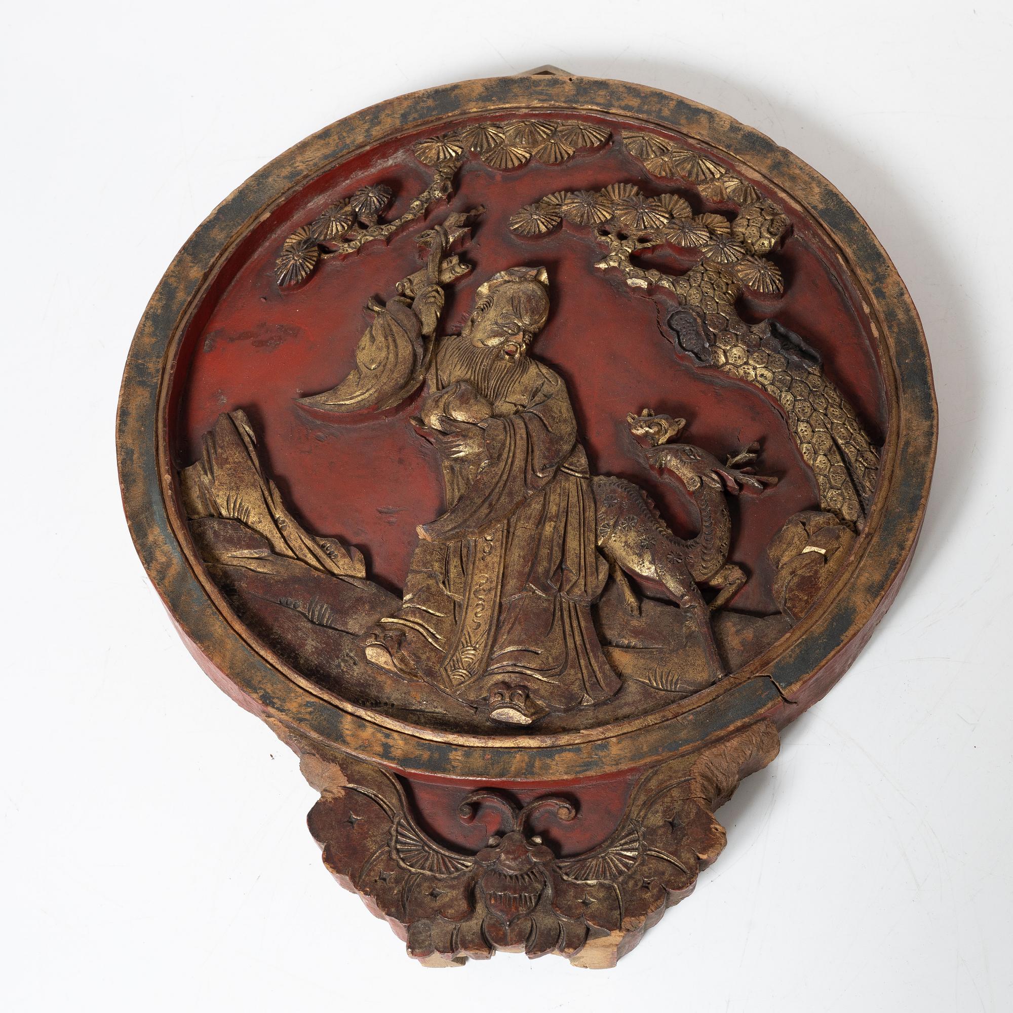 A Chinese wooden panel. 20th century.