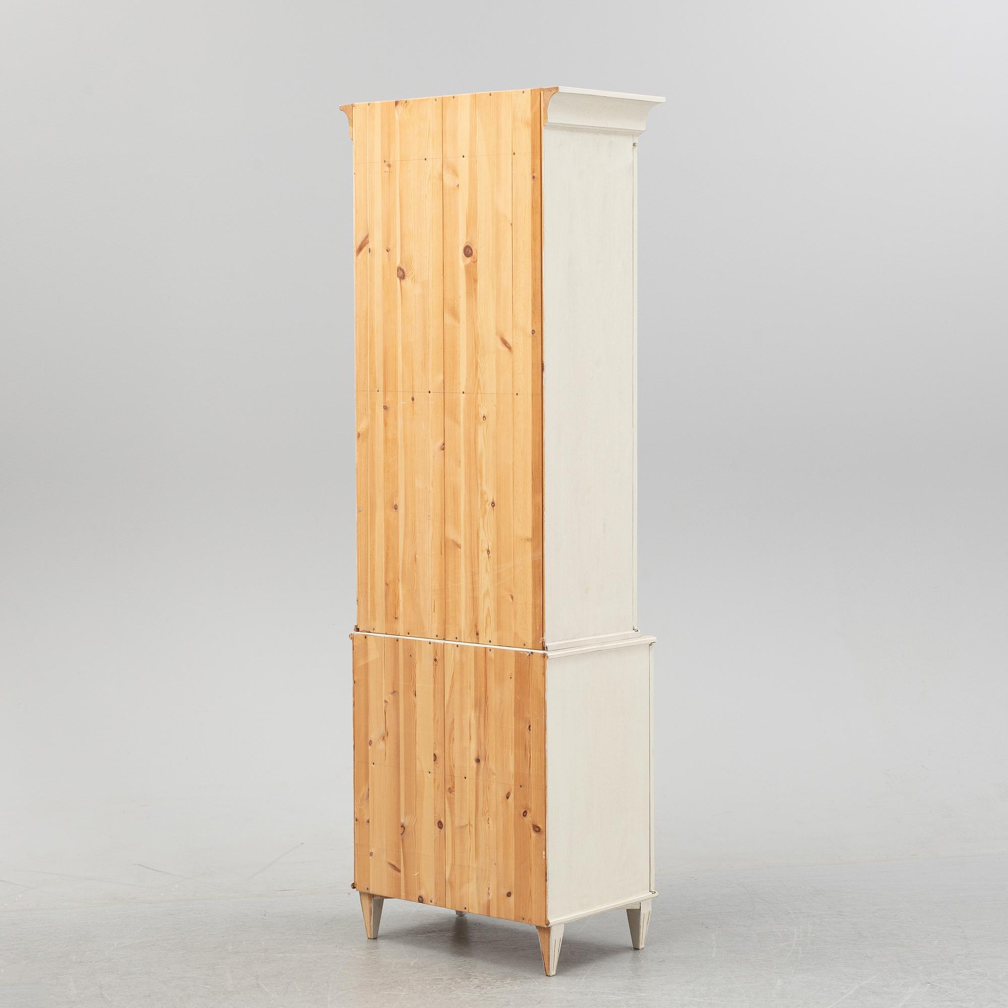 A contemporary Gustavian style cabinet.