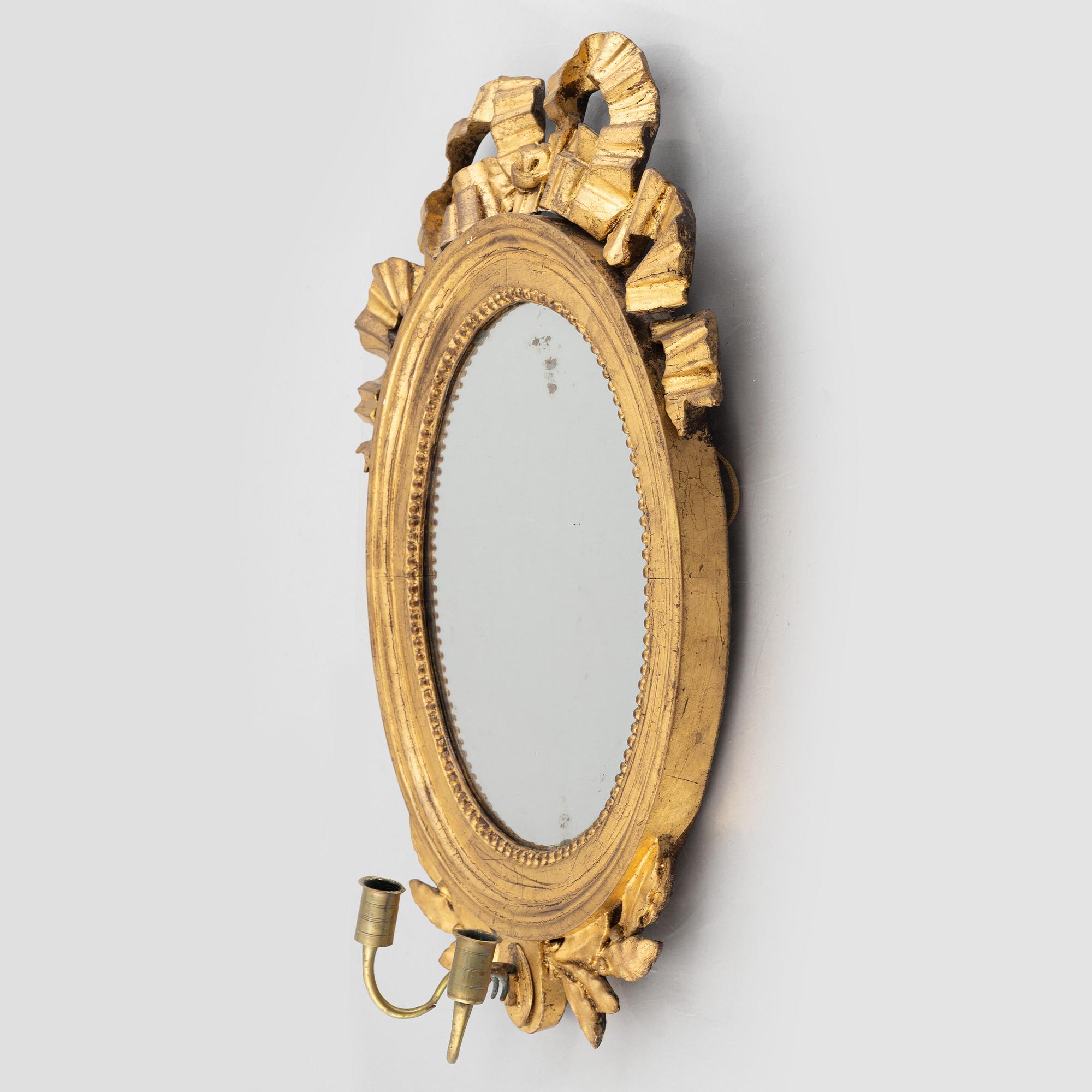 A Gustavian mirror wall sconce, late 18th Century.