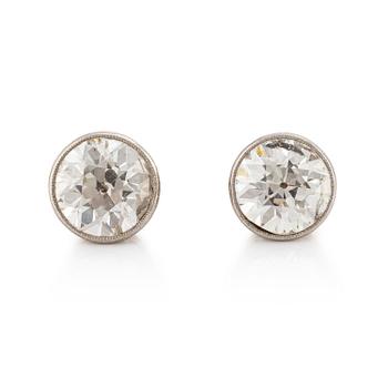 A pair of earrings in gold with old-cut diamonds.