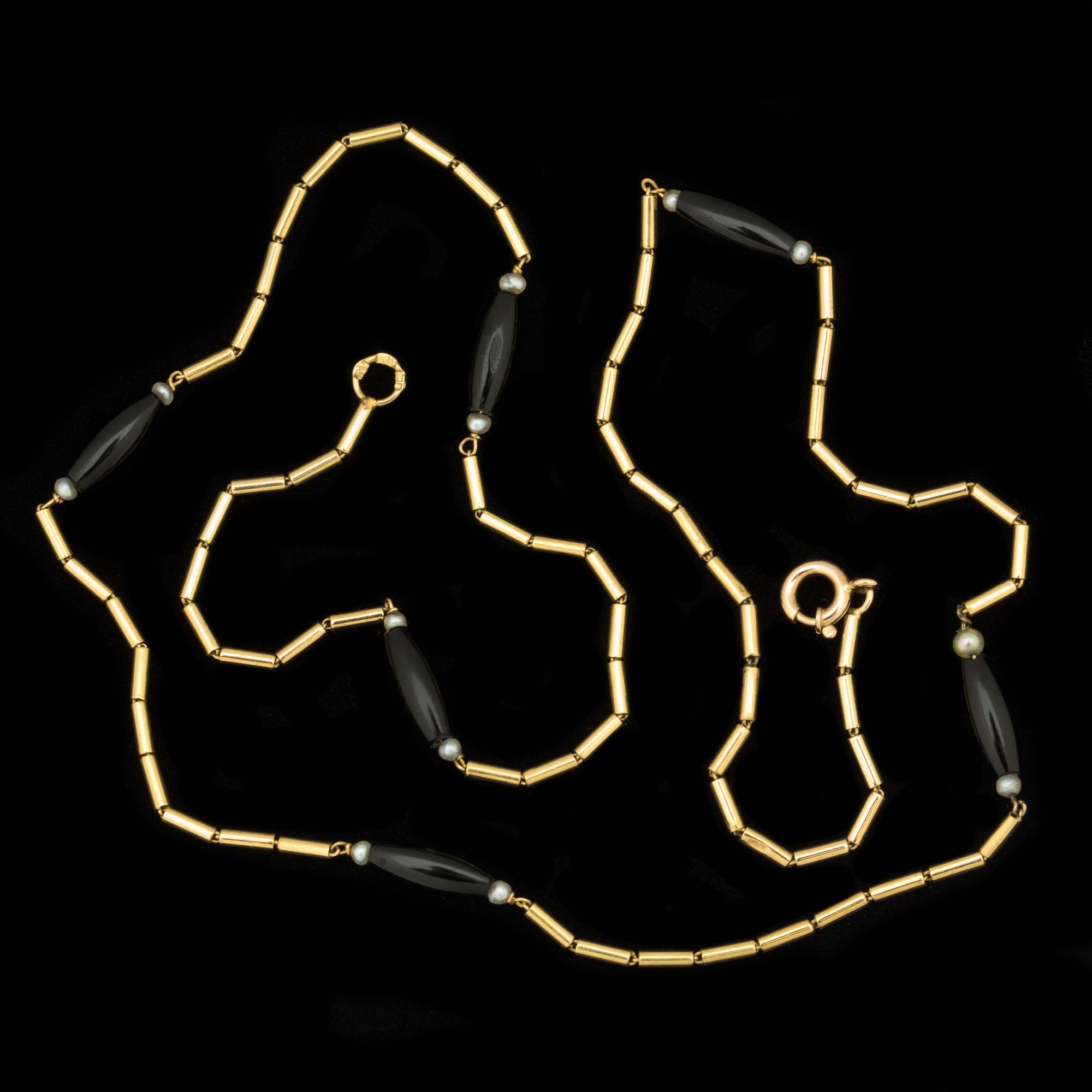 COLLIER, 18 k guld med onyx samt pärlor. Vikt ca 5 g.