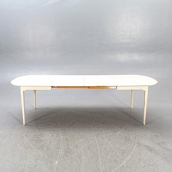 A Carl Malmsten dining table alter part of the 20th century.