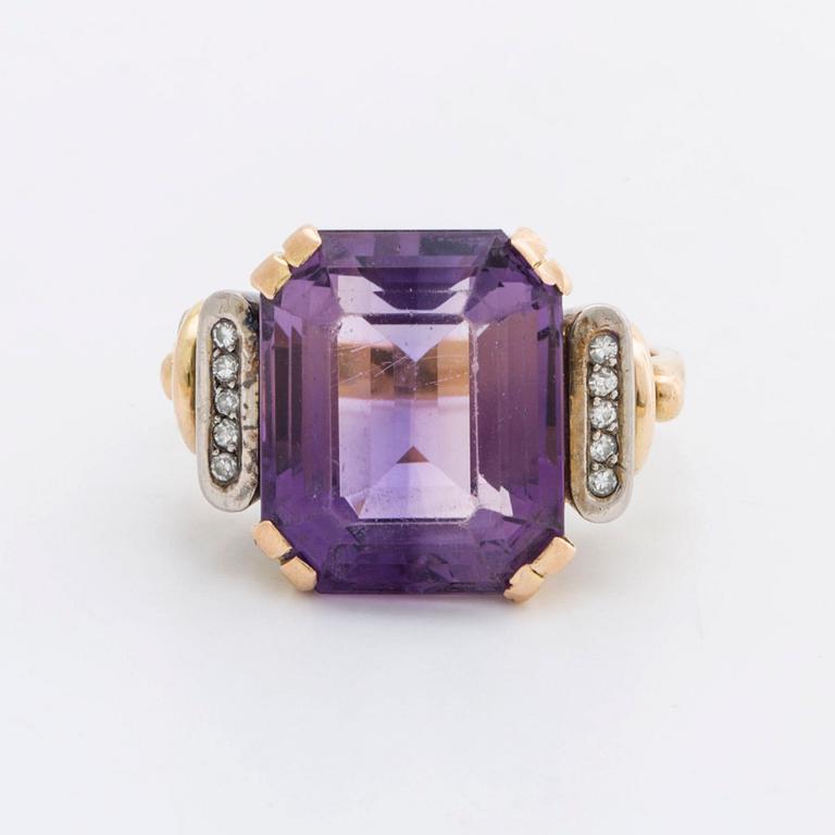 RING 18K gold w 1 amethyst approx 14 x 12 mm and10  single-cut diamonds approx 0,05 ct in total, G Dahlgren & Co Malmö.