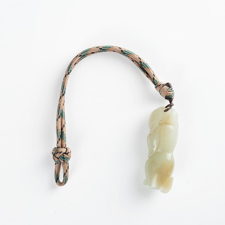 Amulett och skulptur, nefrit, 1900-tal.