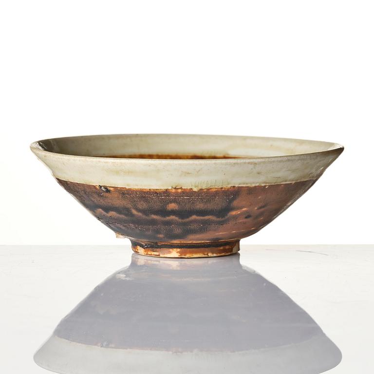 A brown and white glazed bowl, Song dynasty (960-1279).