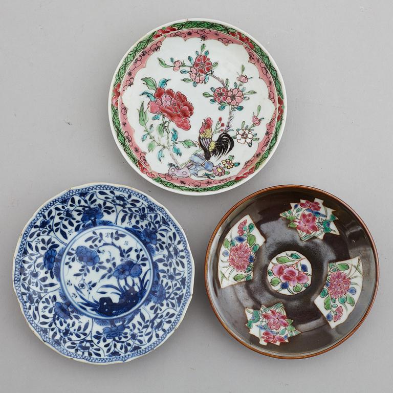 A famille rose butter tureen with cover and two cups with three odd stands, Qing dynasty, Qianlong (1736-95).