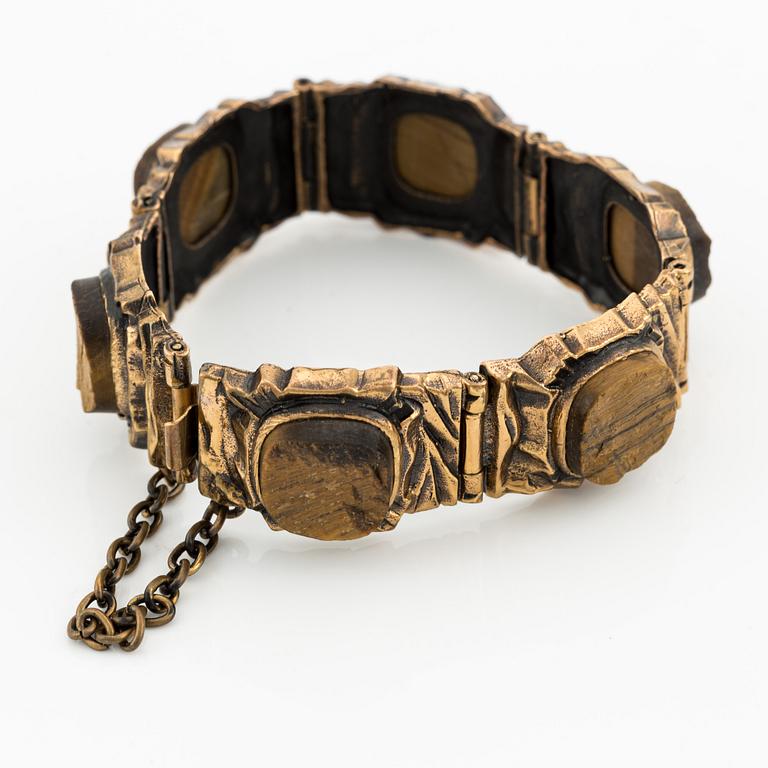 Pentti Sarpaneva, Bracelet and ring, bronze and tiger's eye.
