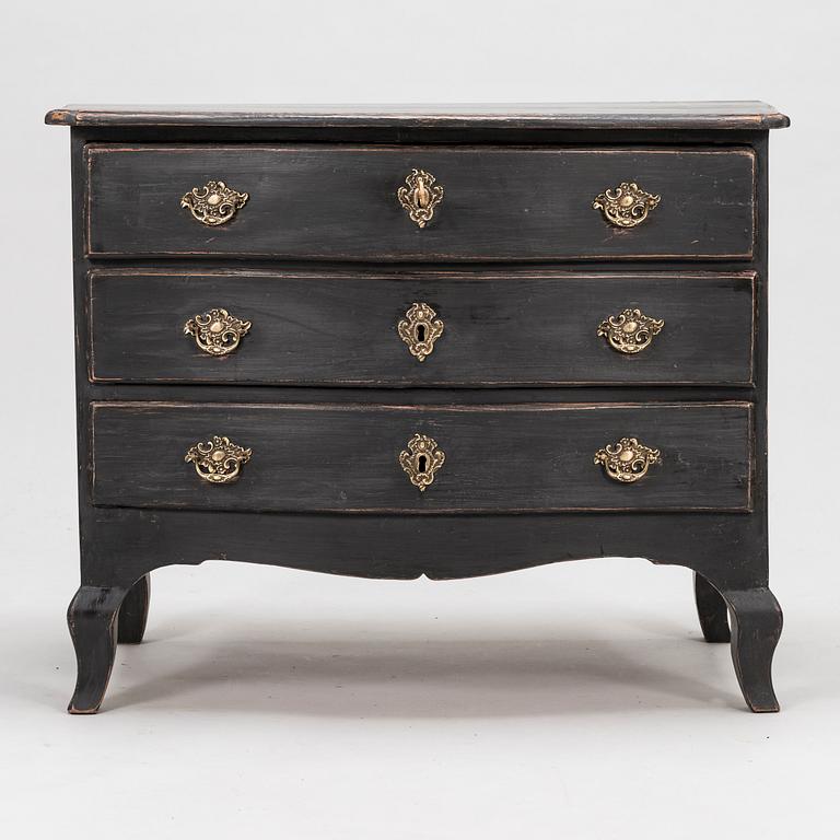 An 18th-Century chest of drawers.