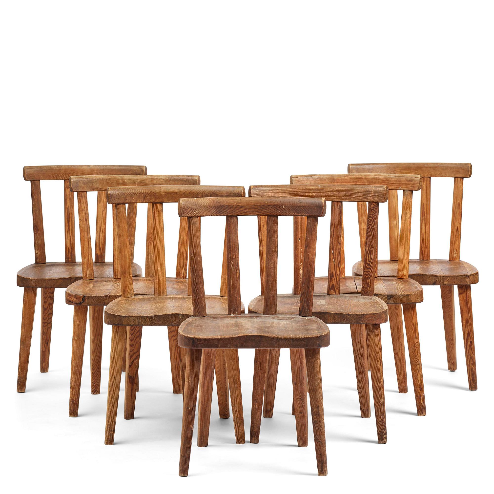 Axel Einar Hjorth, a set of seven stained pine "Utö" chairs, Nordiska Kompaniet, Sweden, 1930s.