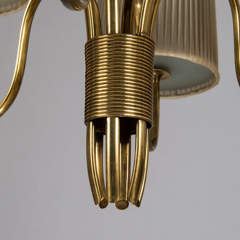 Paavo Tynell, a six-armed brass pendant ceiling light, Taito/ Idman, mid-20th century.
