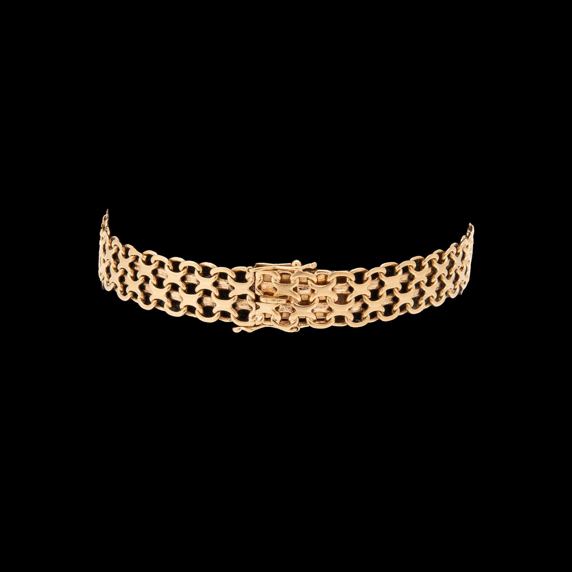 An 18K gold x-link bracelet.