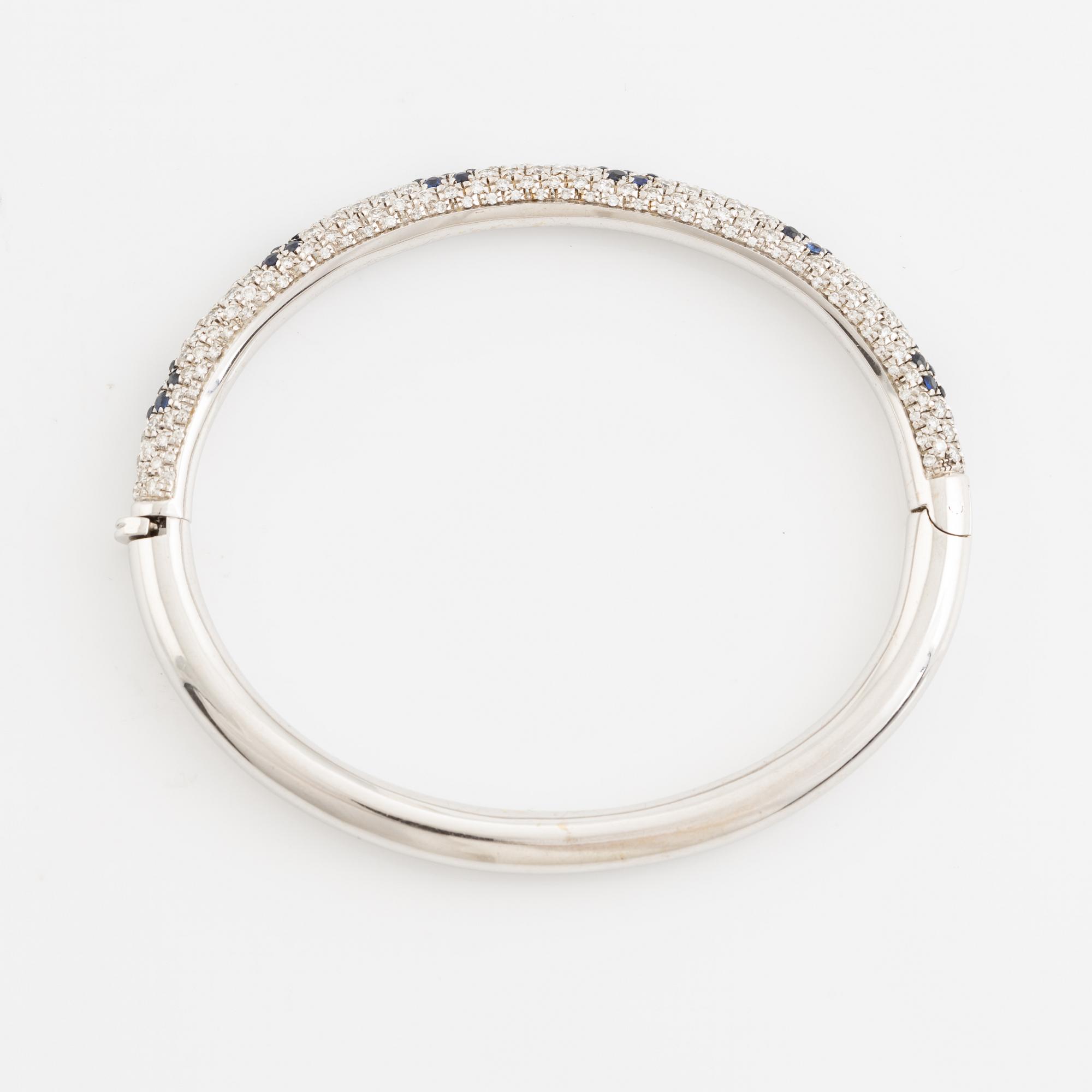 Sapphire and brilliant cut diamond bangle.
