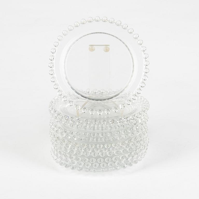 René Lalique, twelve signed glass dishes, 'Andlau', the model designed in 1933.