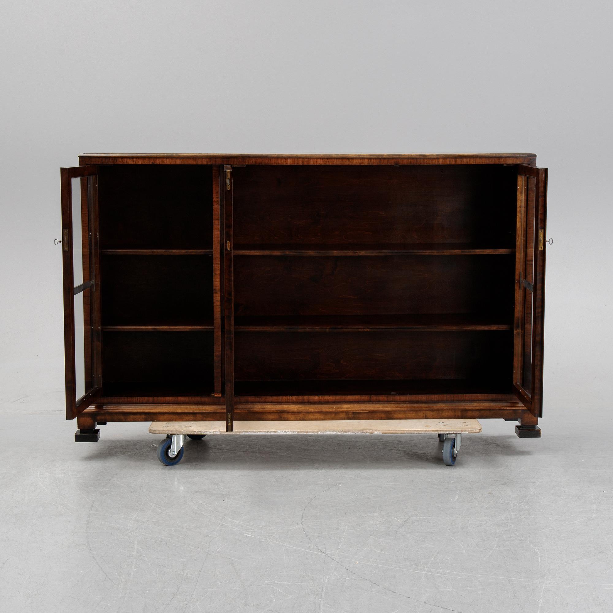 A birch display cabinet, Swedish Grace, first half of the 20th century.