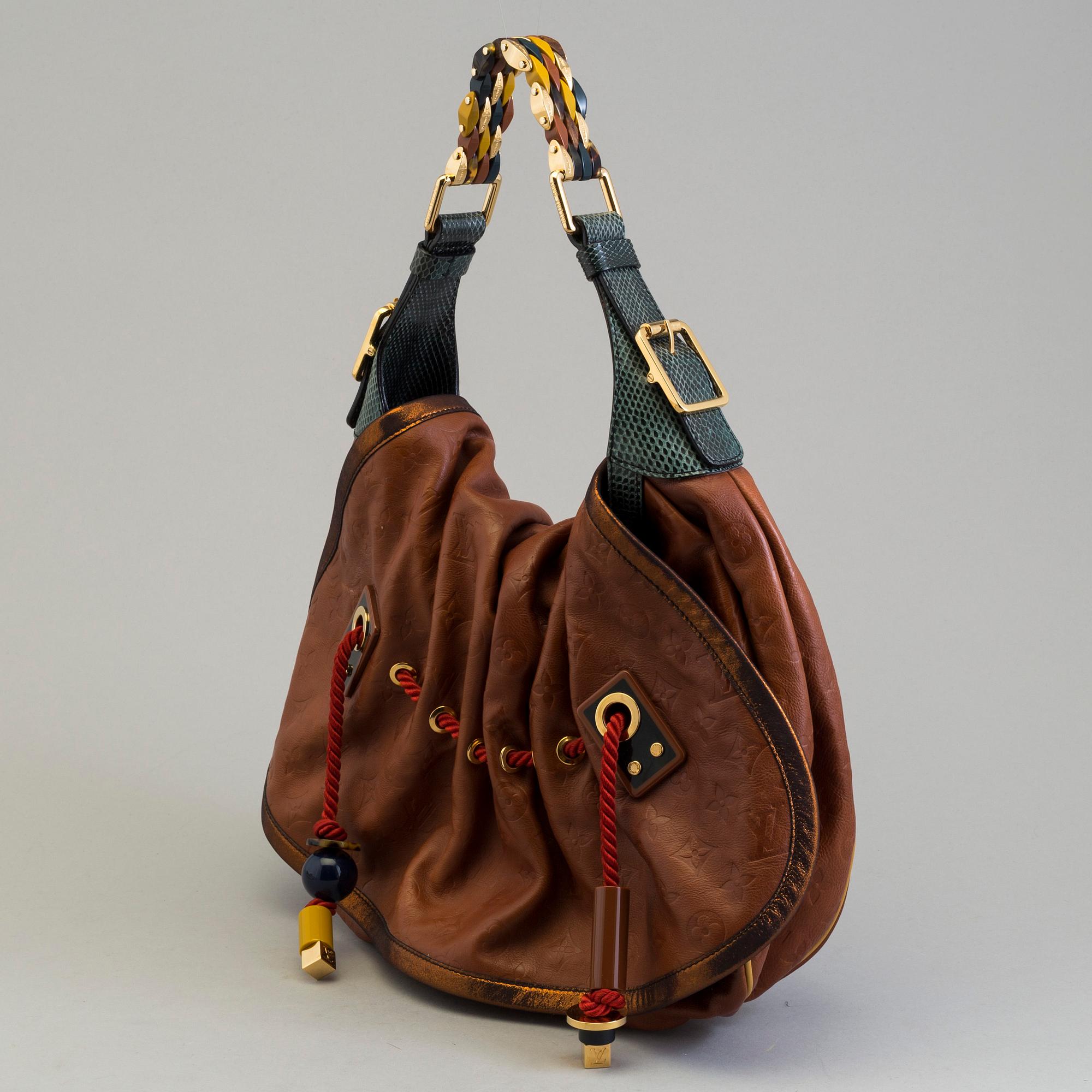 Louis Vuitton Limited Edition Monogram Epices Kalahari GM Bag.