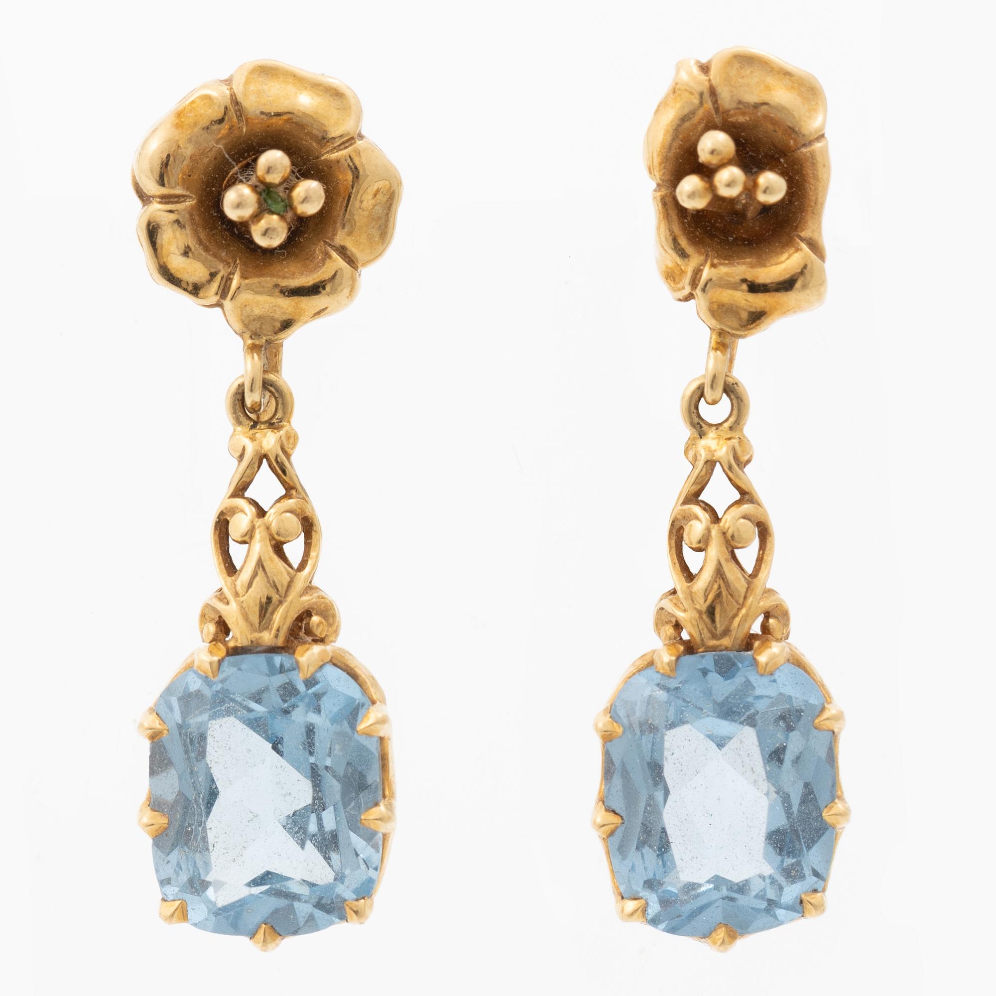 Earrings, 18K gold with synthetic blue spinels.