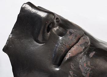 Hertha Hillfon, a black glazed stoneware wall sculpture in two parts of a face and a sky, executed in her own studio, Stockholm 1960s.