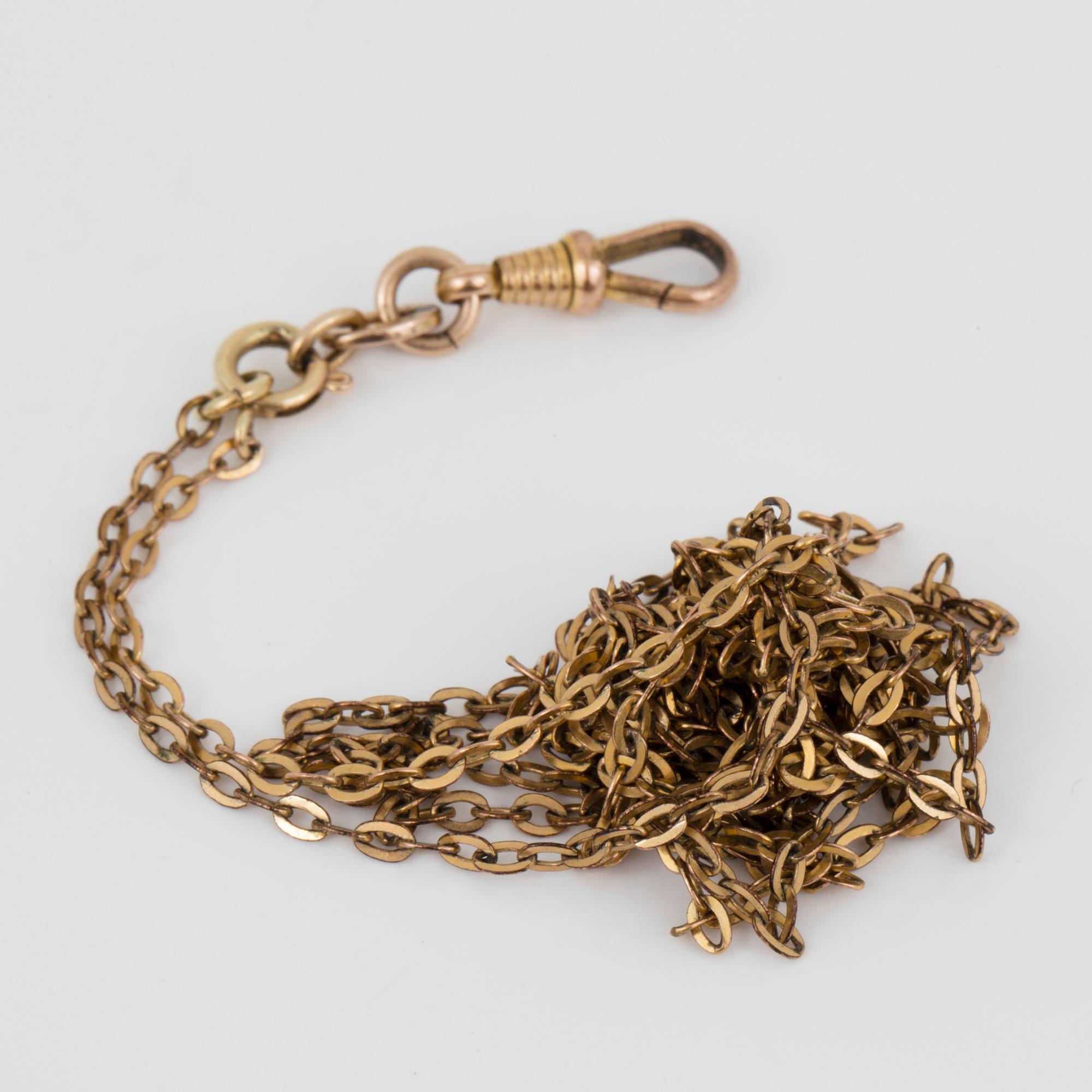 DAMFICKUR, 14 k guld, omkring 1900. Vikt ca 40 g.