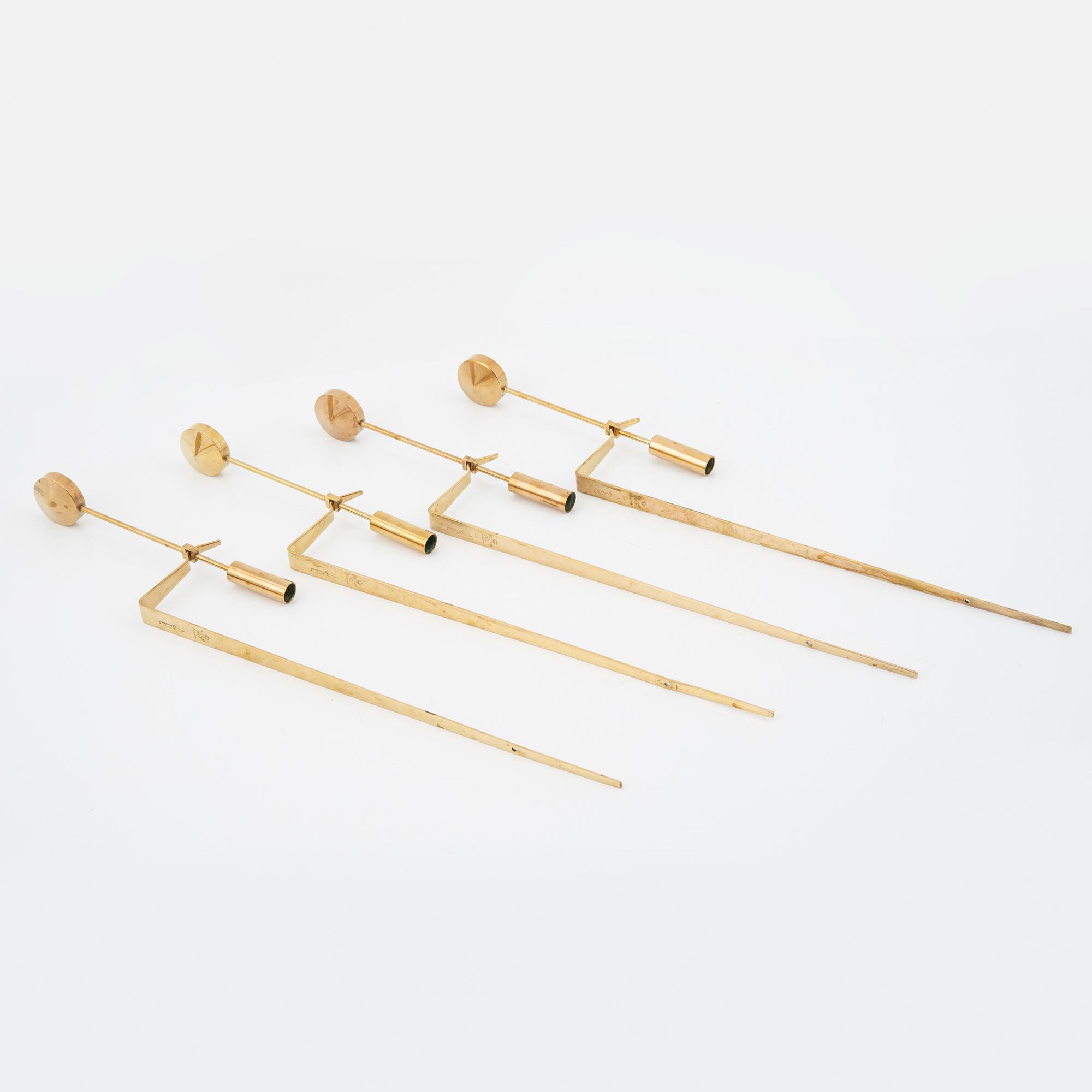 Pierre Forssell, a set of four brass 'Pendeln' wall lights from Skultuna, late 20th Century.