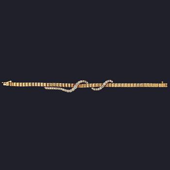 A gold and brilliant cut diamond bracelet, tot. app. 1.70 cts.