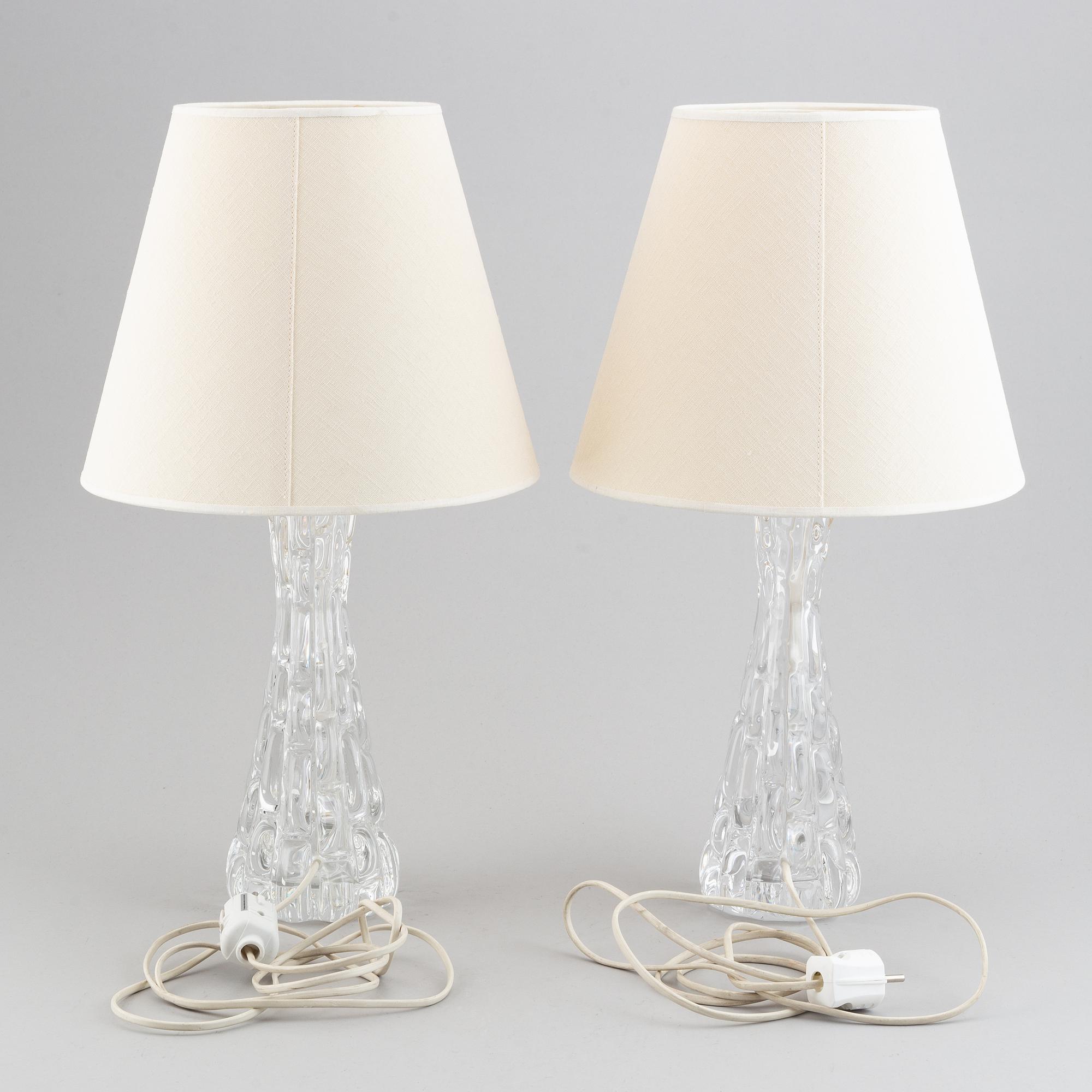 Carl Fagerlund, a pair of model "1477" table lamps for Orrefors.