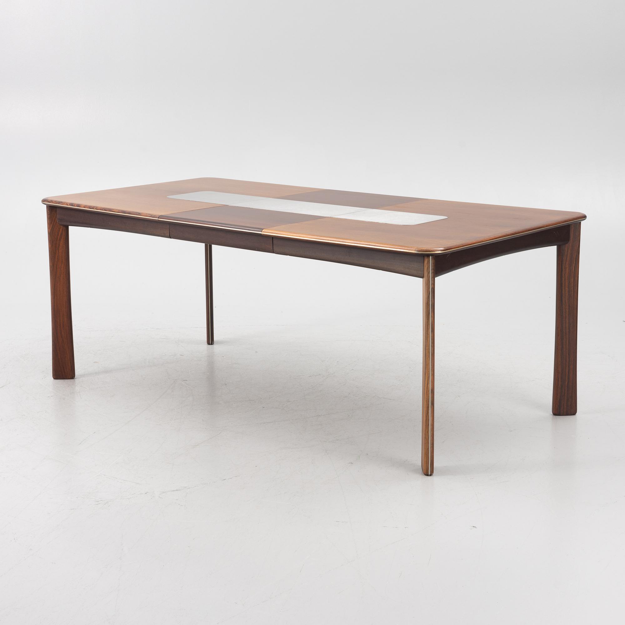 A dining table and six chairs, Uldum Møbelfabrik, Denmark, 1960's/70's.