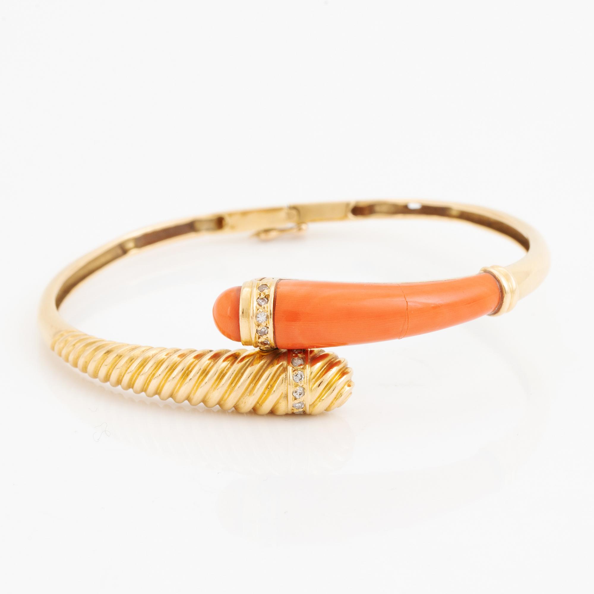 Gold and coral and diamond bangle.