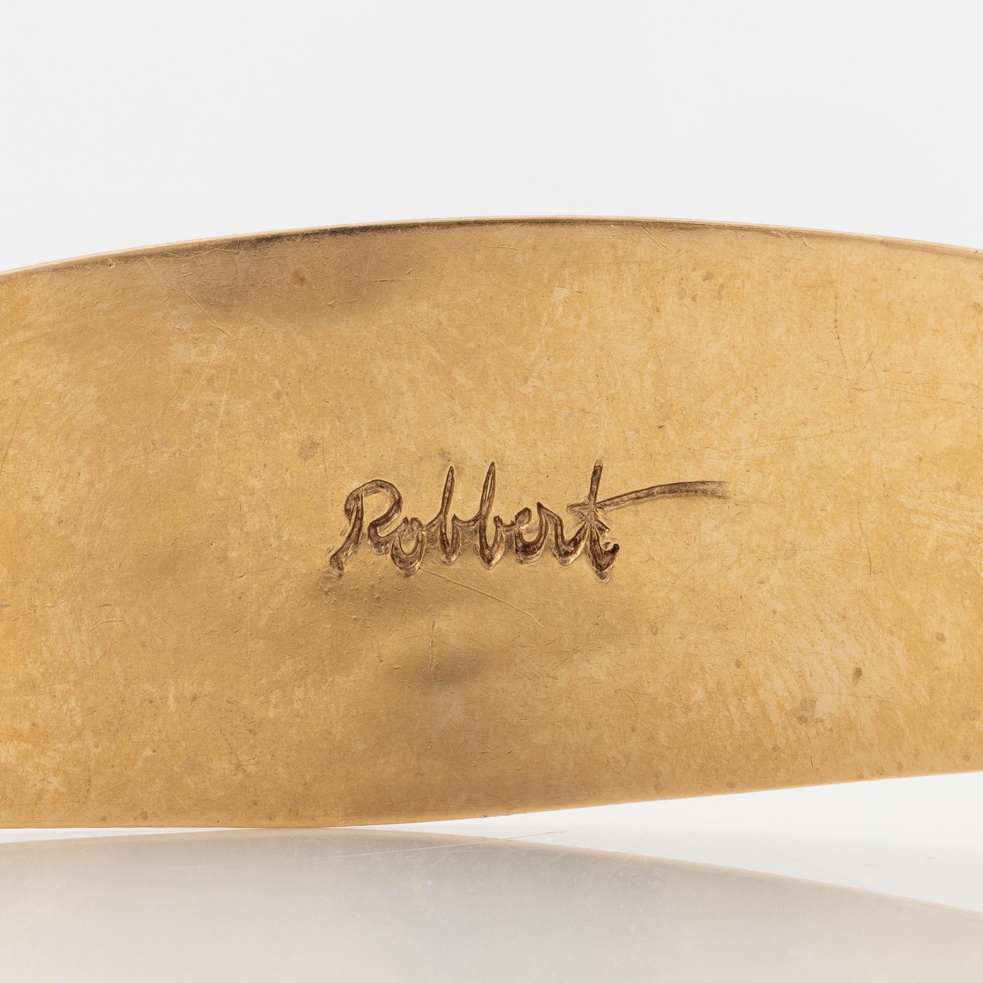 Bracelet, Robbert, 18K gold with red stones. Trosa 1971.