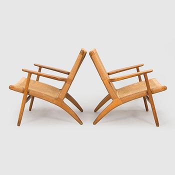 Hans J. Wegner, Armchairs, a pair, "CH25", Carl Hansen & Son, Denmark, 1960s.