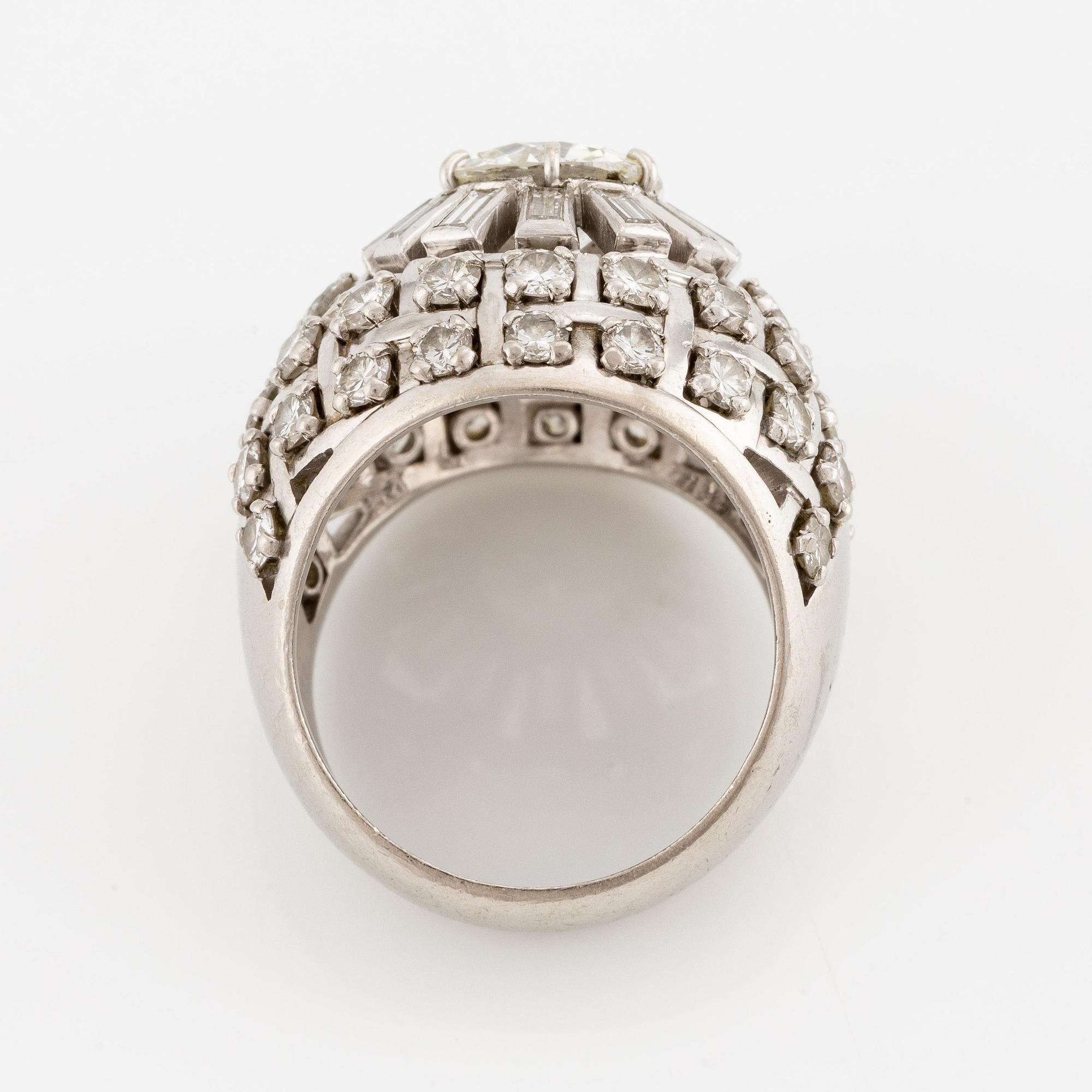 A platinum ring with an old-cut diamond ca 1.90 cts ca I/J i.