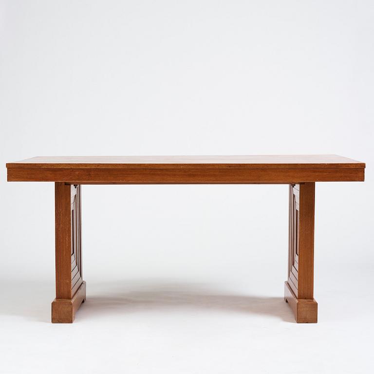 Oscar Nilsson, attributed to, a stained oak table, probably executed at Isidor Hörlin AB, Stockholm, 1930-40's.