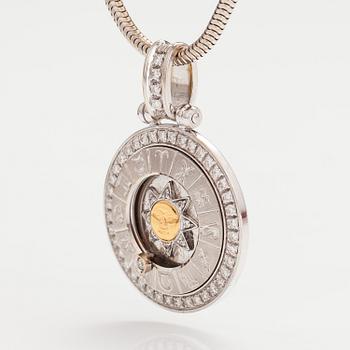 An 18K white gold horoscope pendant with a 14K white gold chain. Diamonds ca. 0.78 ct in total. Silvan.