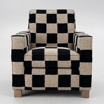 A 'Caspian Club Chair' by RIJD, contemporary.