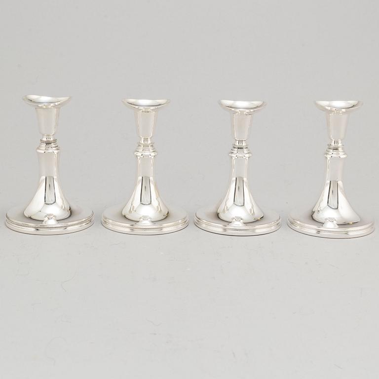 A set of four Swedish silver candlesticks, maker's mark Erik Löfman, Uppsala 1971-1973.