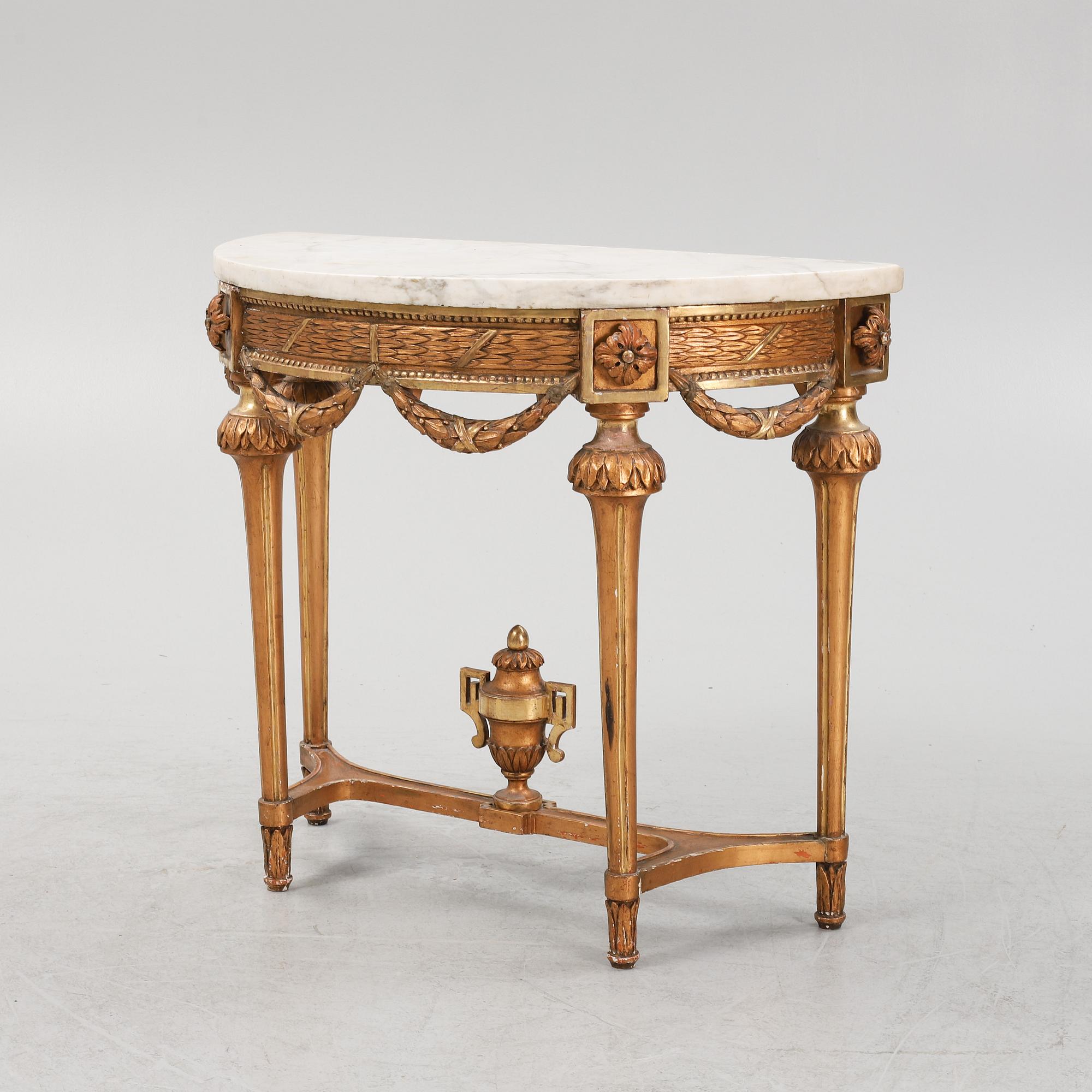 A Gustavian giltwood and marble console table, late 18th century.