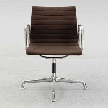 A model EA 108 swivel armchair by Charles and Ray Eames for Herman Miller, designed 1958.