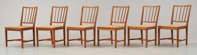 A suite of six Josef Frank mahogny dining chairs, Svenskt Tenn, model nr 815.