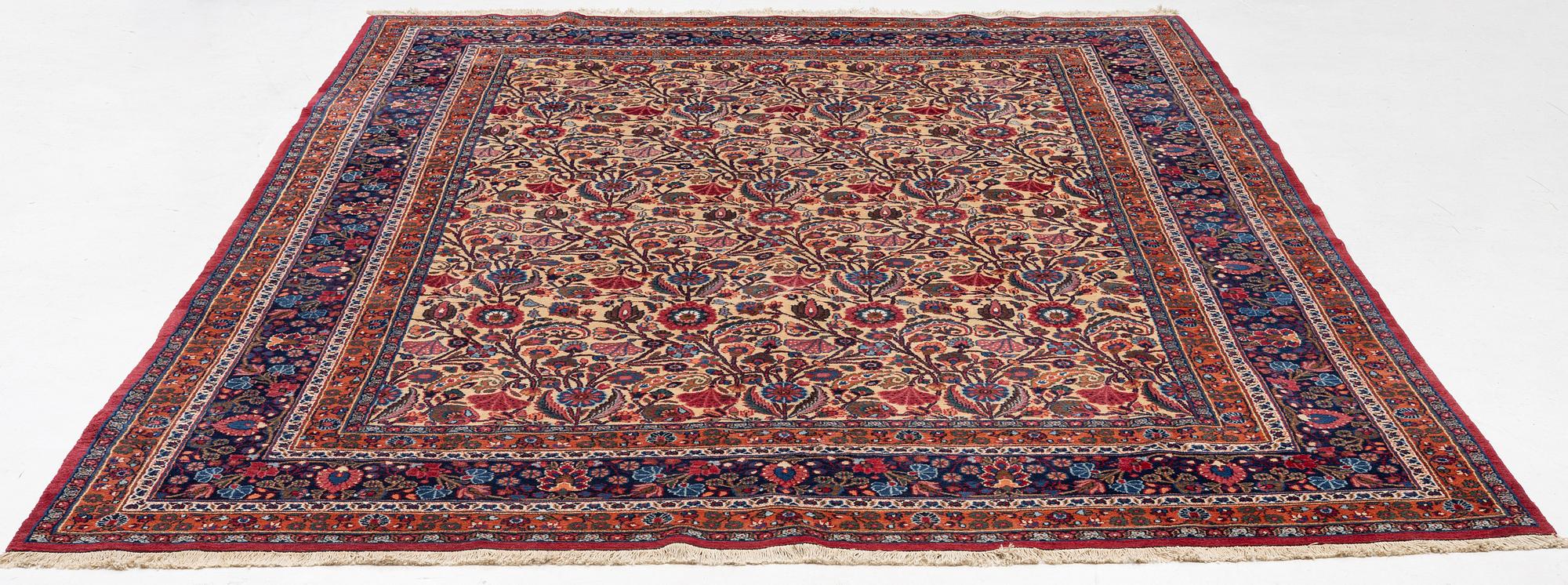 A semi-antique Birjand carpet, Eastern Iran, signed, c 390 x 296 cm.
