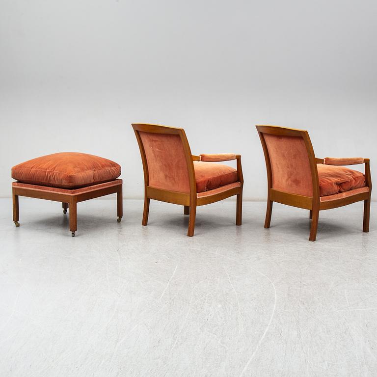 KERSTIN HÖRLIN-HOLMQUIST, a pair of 'Ofelia' armchairs with one foot stool, late 20th Century.