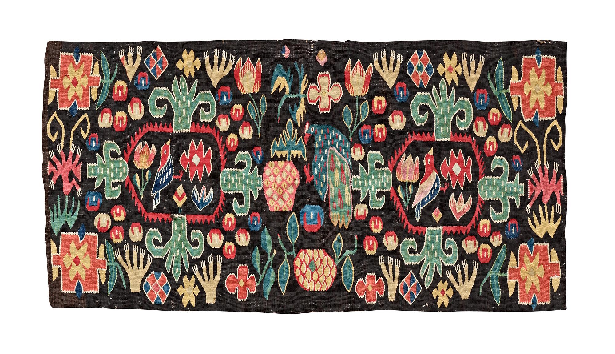 CARRIAGE CUSHION. "Birds and flowers". Tapestry weave. 51,5 x 96 cm. Scania, Sweden, second half of the 18th century.