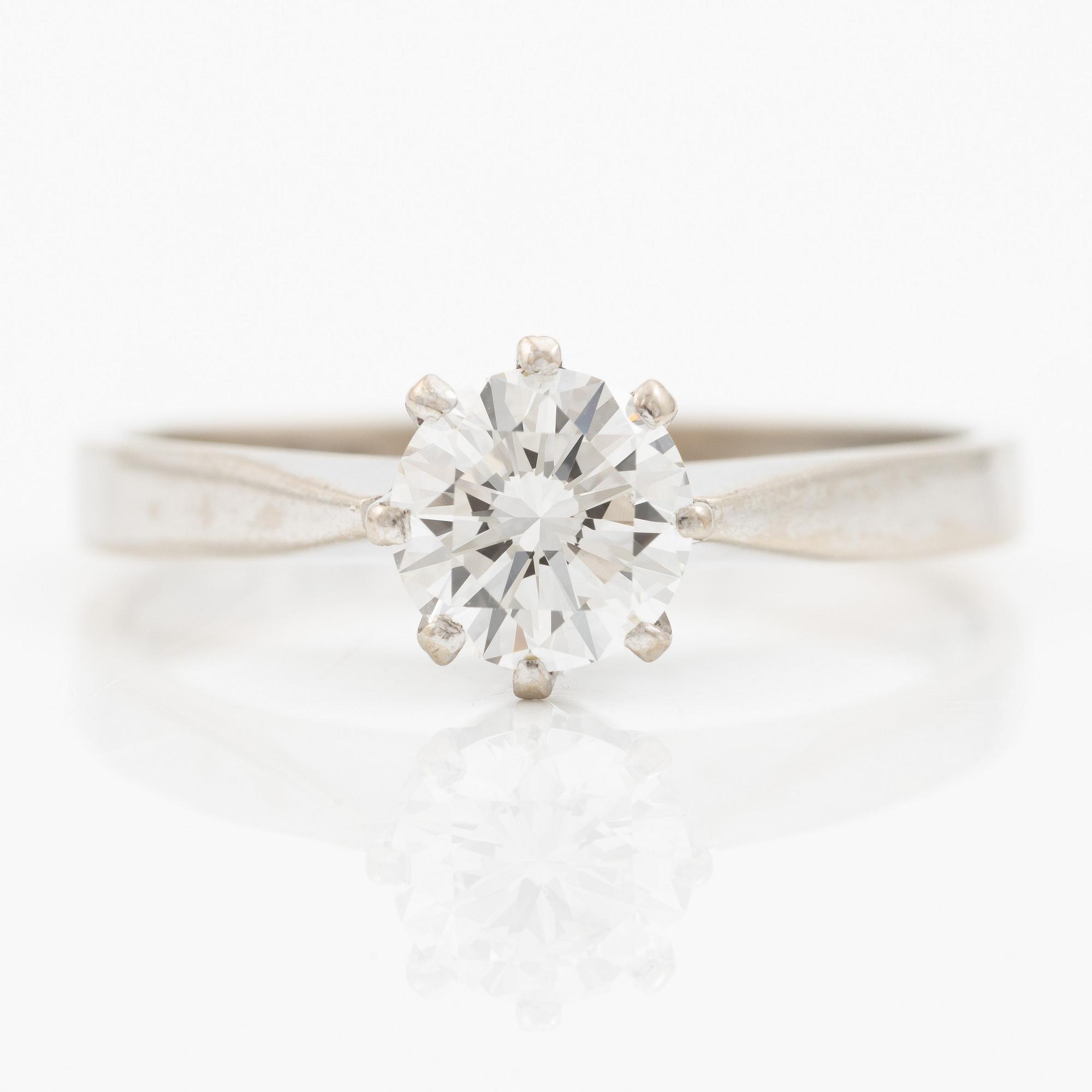 Ring in 18K white gold set with a brilliant-cut diamond weighing 0.84 ct according to the engraving.