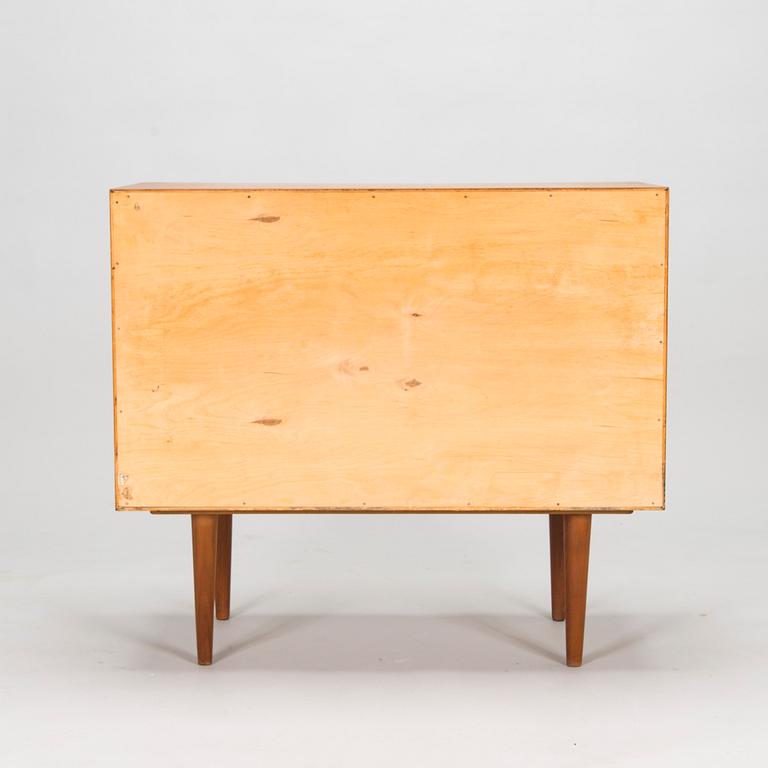 Kai Kristiansen, a teak veneered chest of drawers, FM mobler, Denmark, mid 20th century.