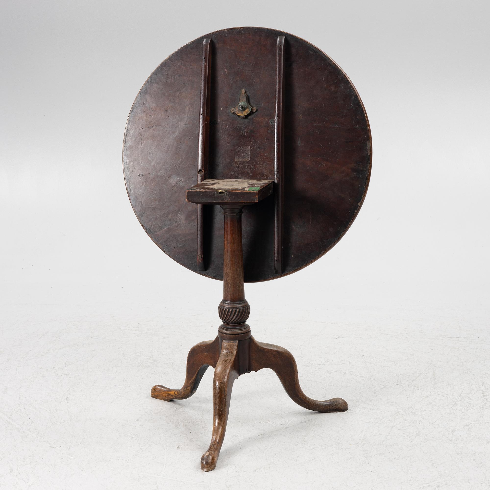 A tilt top table, 19th centiury.