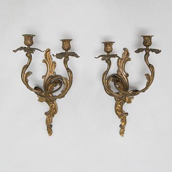 A pair of wall sconces, circa 1900.