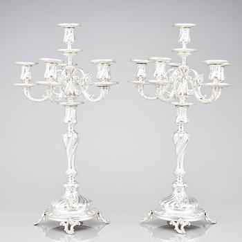 A pair of Swedish silver candelabra, mark of Gustaf Möllenborg (Carl Teodor Feron), Stockholm 1896.