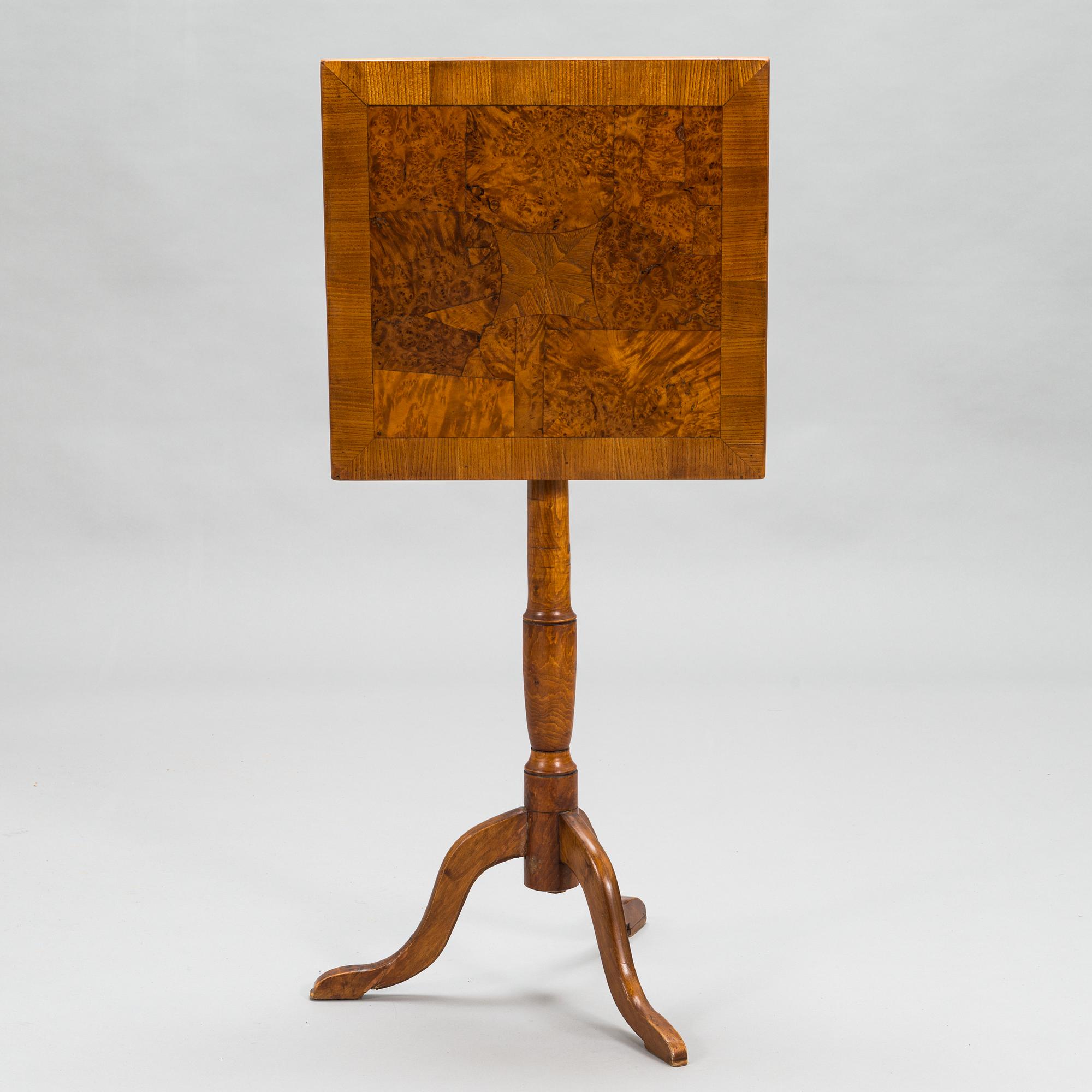 A tilt-top tripod table,  first half of the 19th century.