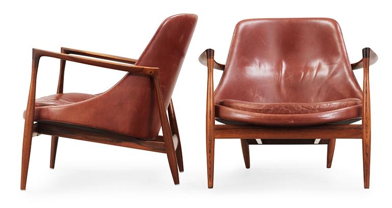 A pair of Ib Kofod Larsen palisander and brown leather 'Elisabeth' easy chairs, Christensen & Larsen, Denmark 1950-60's.